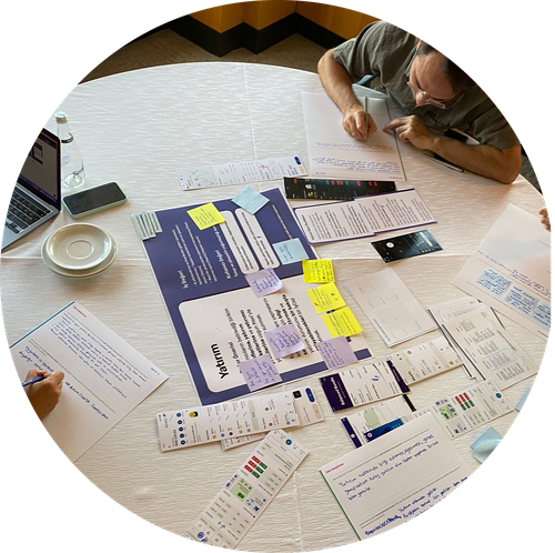 Workshop materials spread across a table, overhead view